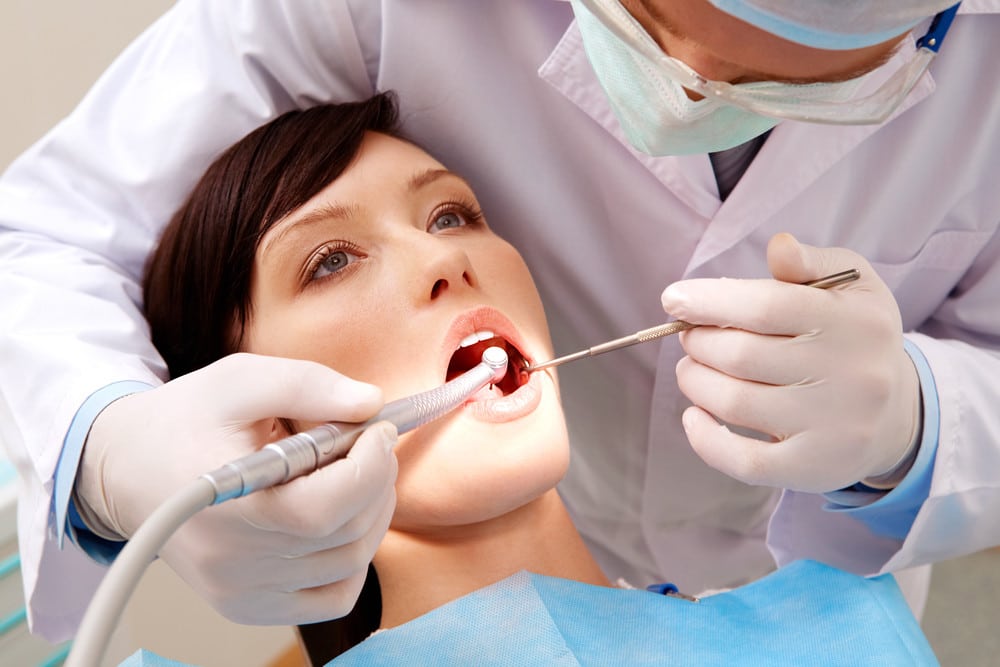 Examining oral cavity